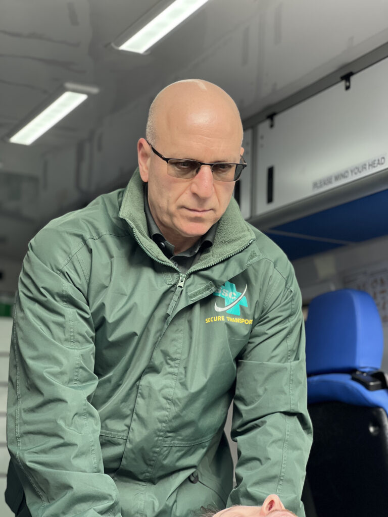 Person providing secure mental health transport service